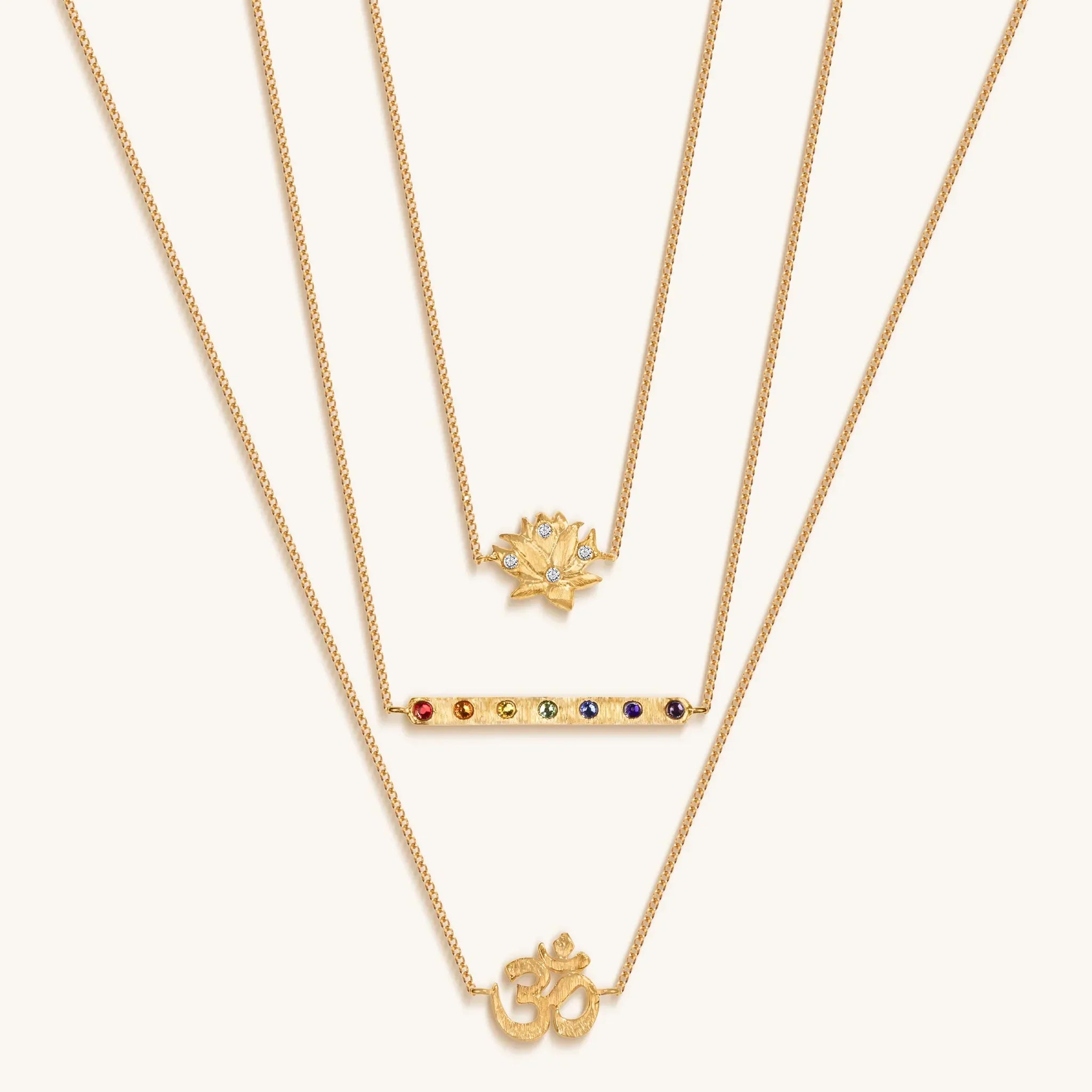 Karma and Luck Aligned in Serenity Lotus OM Chakra Bar Triple Layer Necklace - $129.00 at West Path 